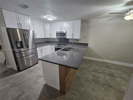 featured image of 7302 Nw 76th Dr #1-2
