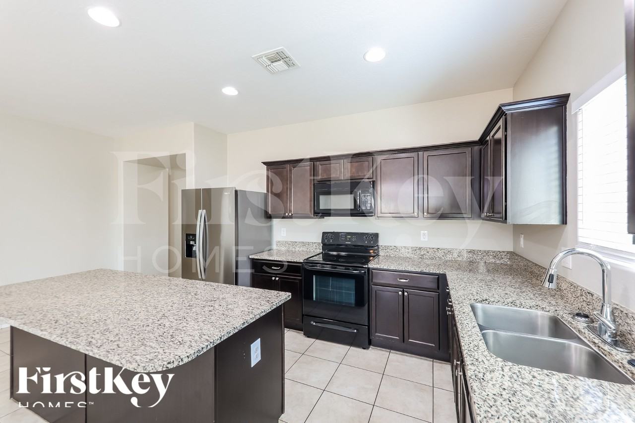 4936 S 238th Ln - Photo 6 of 16