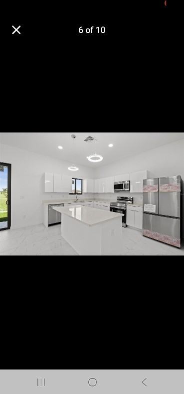 3927 Nw 38th St - Photo 5 of 9