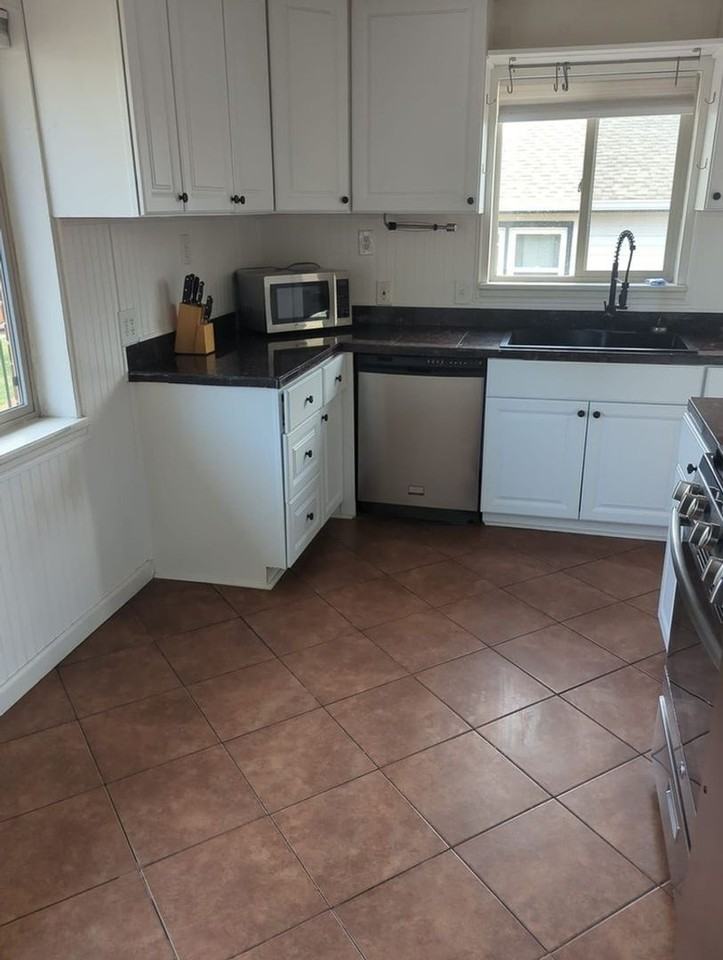 7821 Raleigh St - Photo 6 of 13