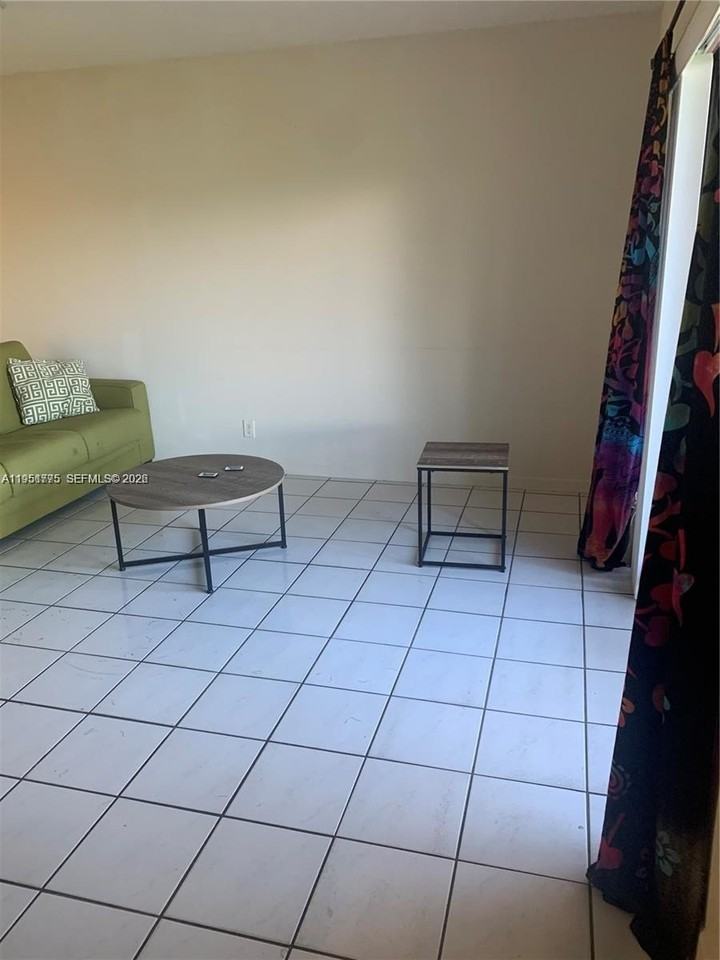 10009 Winding Lake Rd #106 - Photo 4 of 7