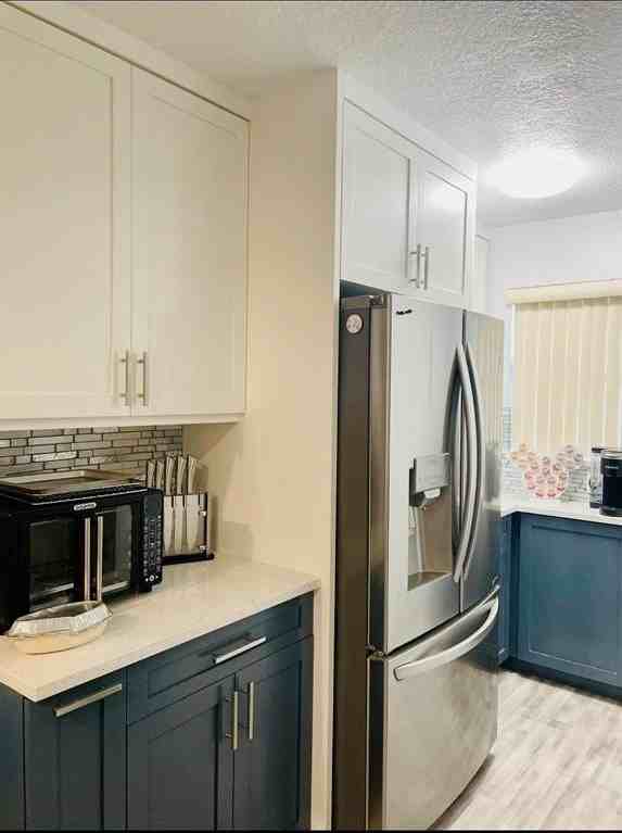 7355 Woodmont Ter #104 - Photo 4 of 25