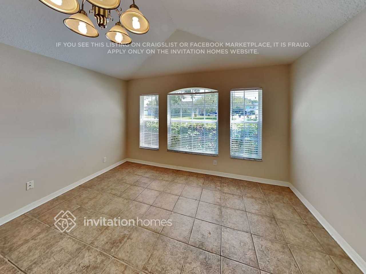 6923 34th Ave E - Photo 6 of 17