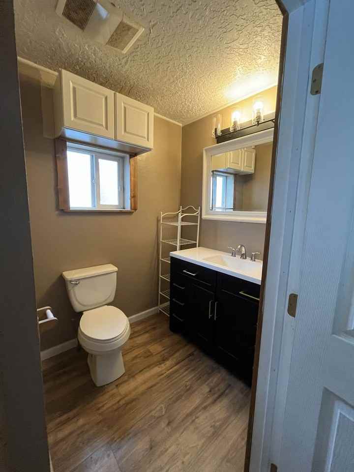 216 7th Ave W - Photo 7 of 12