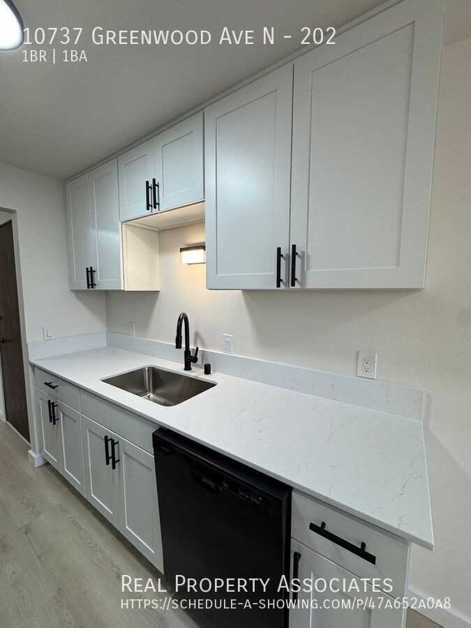 10737 Greenwood Ave N #202 - Photo 3 of 9