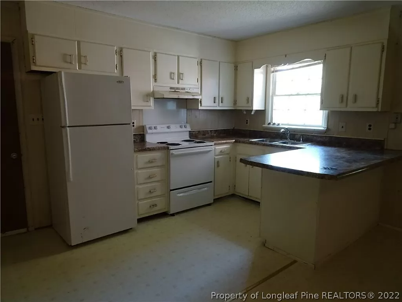 7606 Jennings Ln - Photo 3 of 17