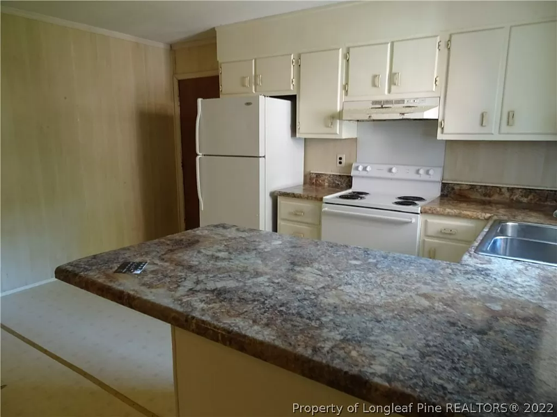 7606 Jennings Ln - Photo 4 of 17