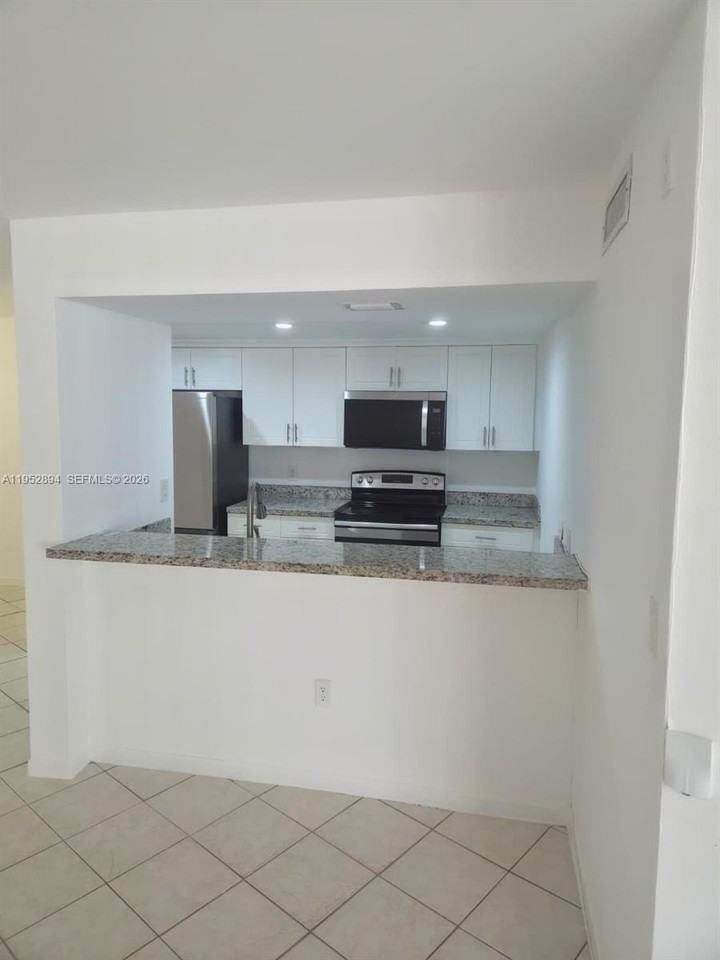 7075 Nw 186th St #C104 - Photo 3 of 24