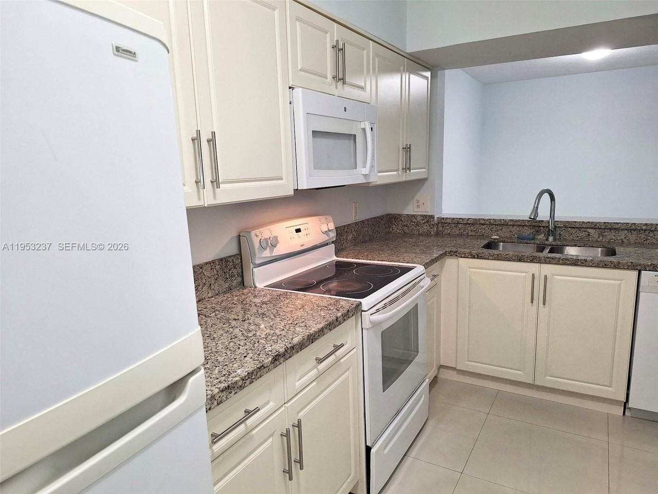 18810 Nw 57th Ave #104 - Photo 6 of 20