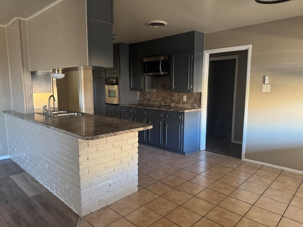 3310 Camarie Ave - Photo 7 of 11