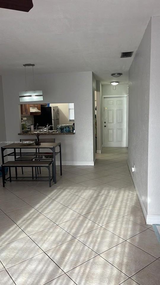 940 Nw 104th Ave #940-203 - Photo 3 of 5