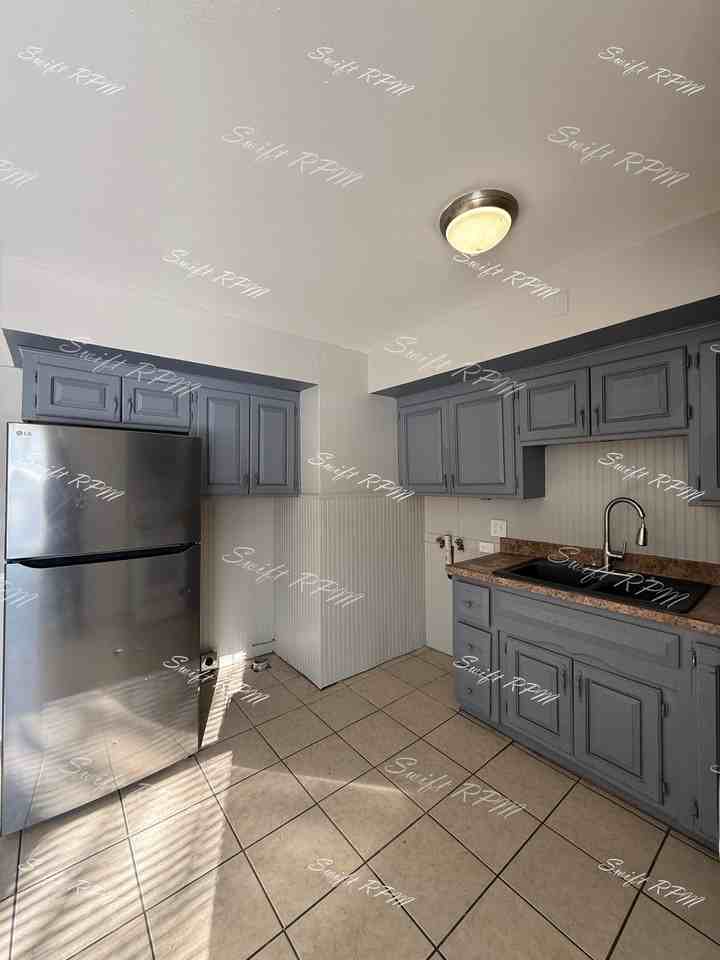 7003 E 113th St #1 - Photo 4 of 16