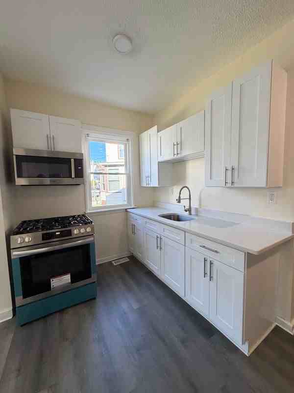 13 Lines St - Photo 5 of 7