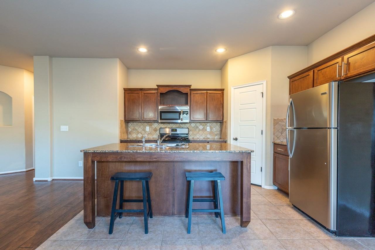 10905 N 117th East Ave - Photo 7 of 28