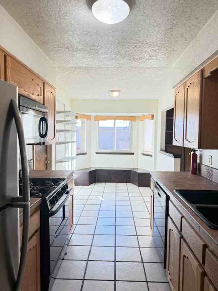 1111 Hupmobile Dr Ne - Photo 5 of 14