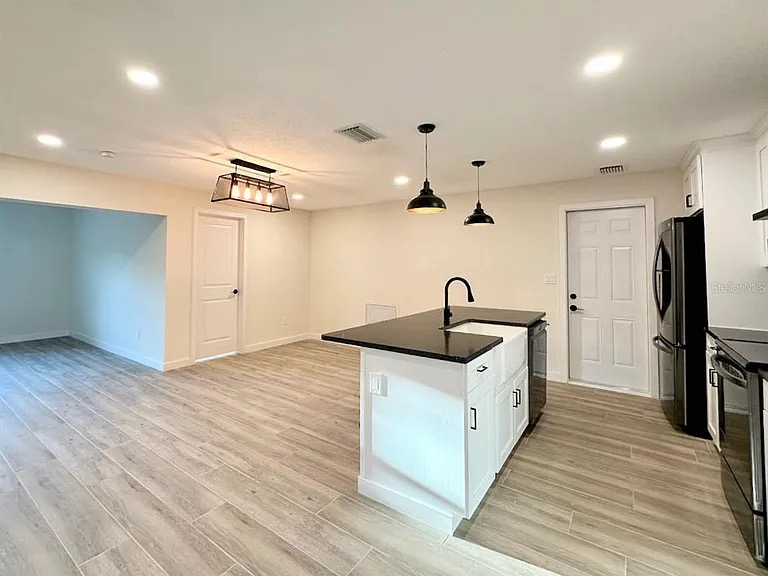 4700 Chancellor St Ne - Photo 7 of 10