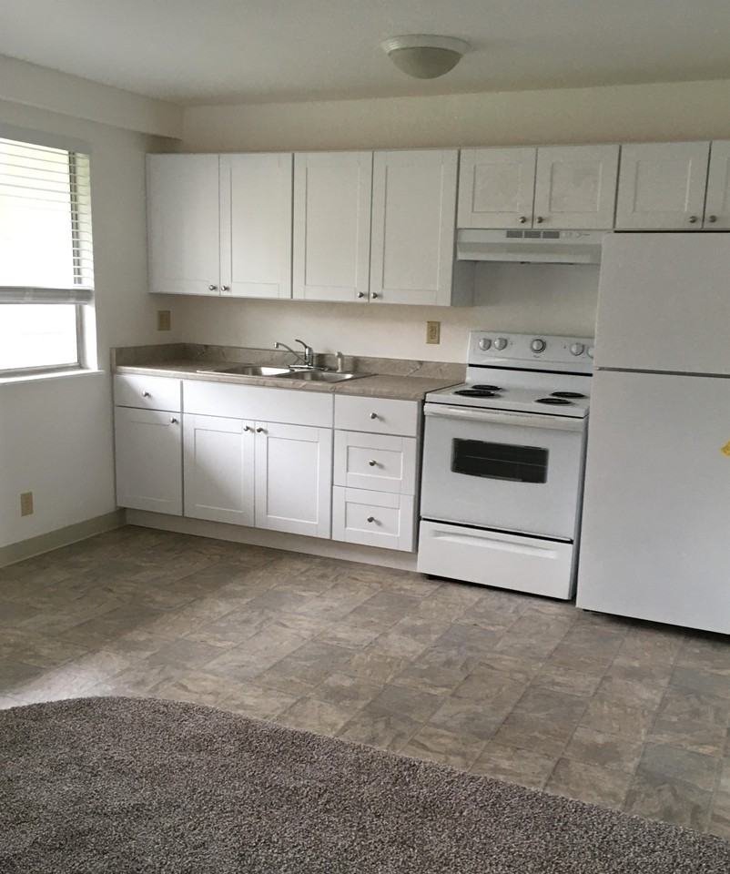 Village Apartments - Photo 2 of 50