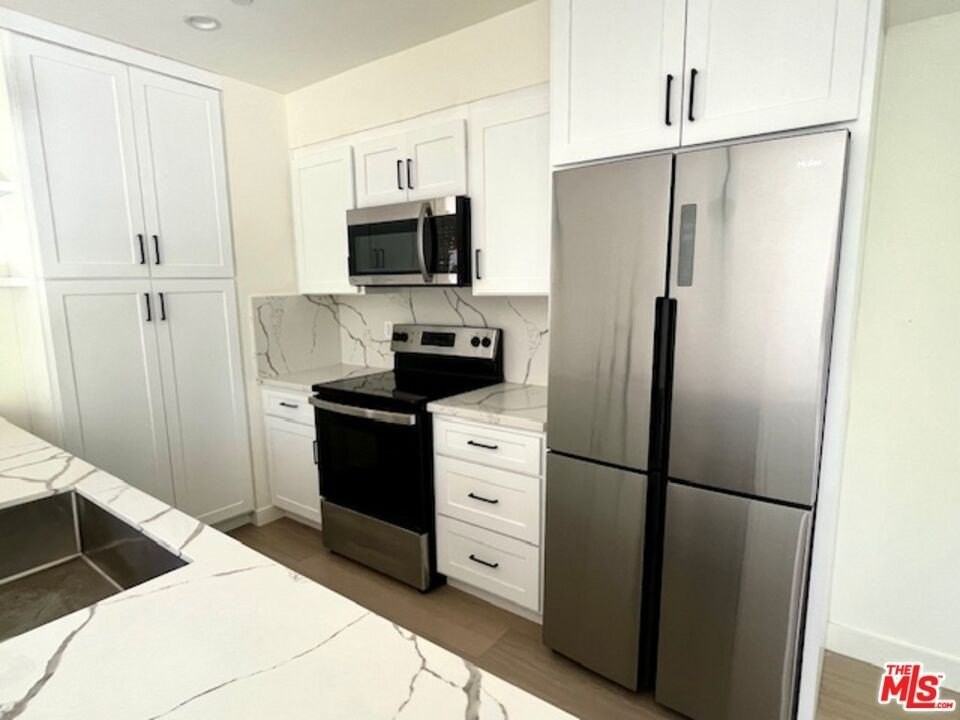 9946 Farragut Dr Unit A #A - Photo 4 of 16