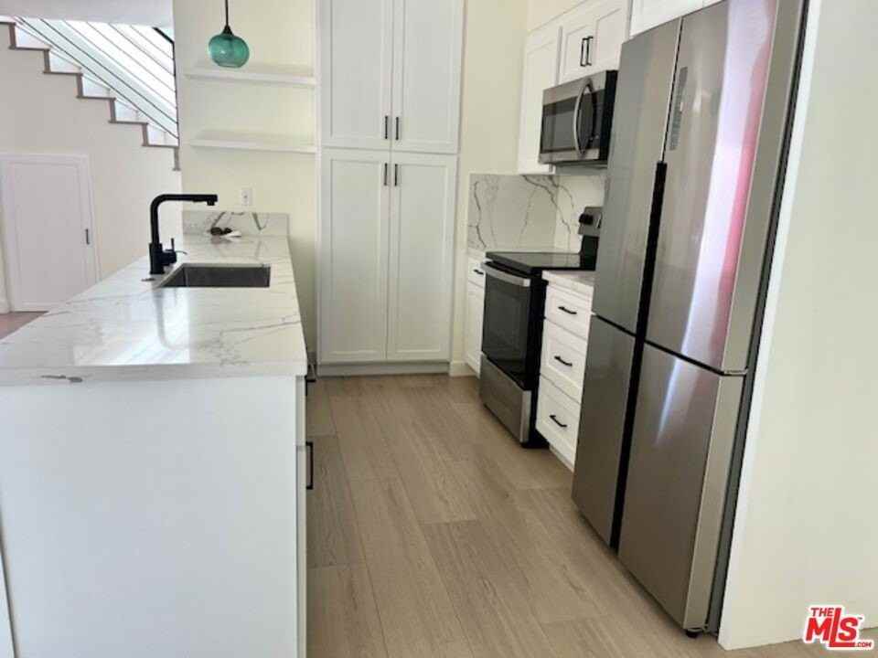 9946 Farragut Dr Unit A #A - Photo 5 of 16