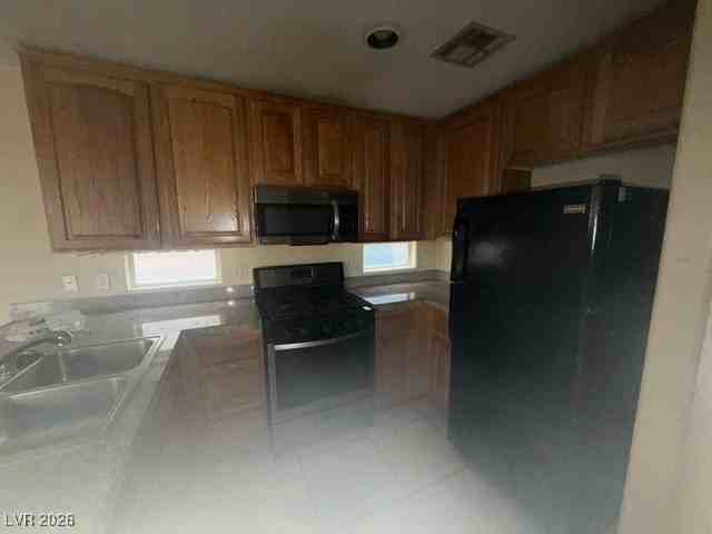 6917 Graceful Cloud Ave - Photo 3 of 6