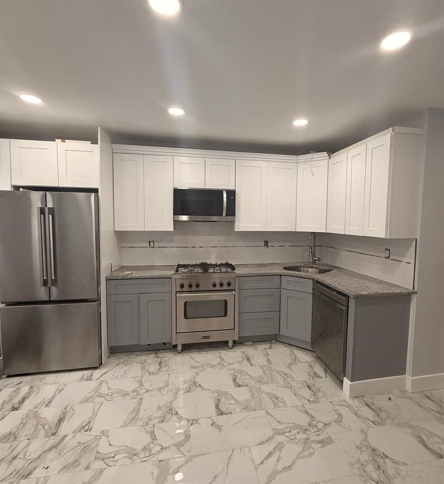 325 57th St #1 - Photo 3 of 4