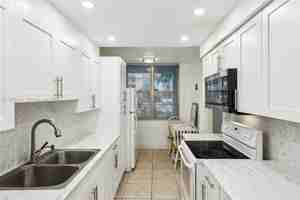 featured image of 2900 Nw 48th Ter #115