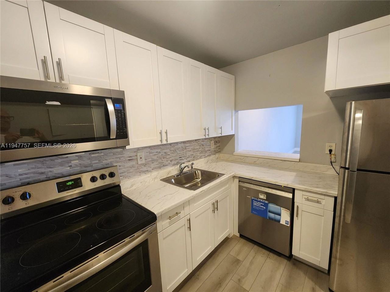 11309 Sw 200th St #303C - Photo 2 of 8
