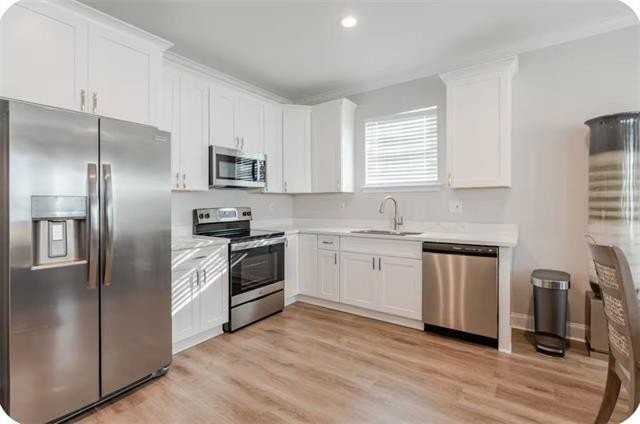 1234 Louisa St - Photo 4 of 29