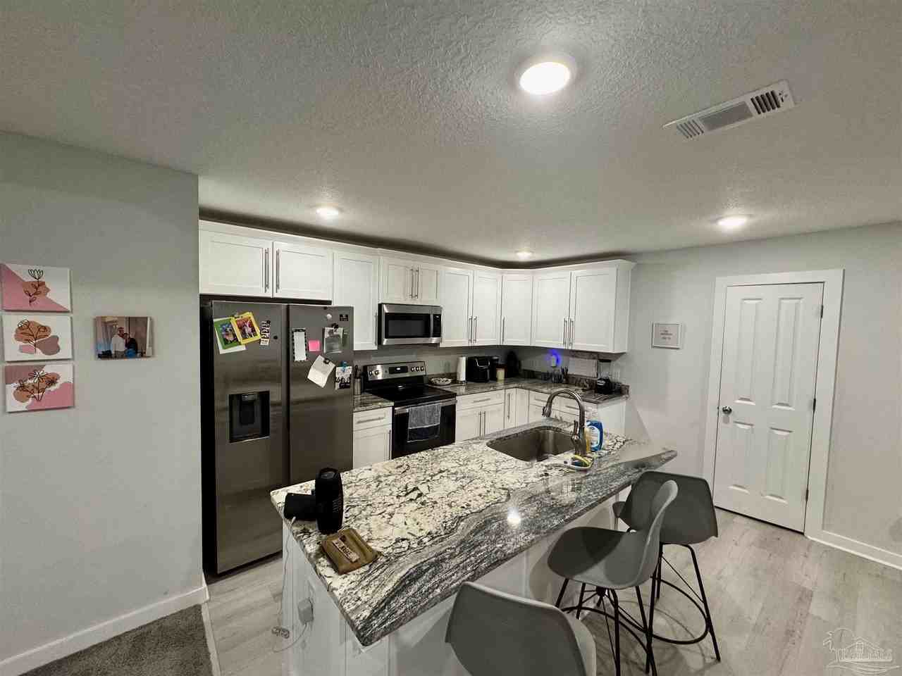 8720 Fowler Ave - Photo 7 of 26