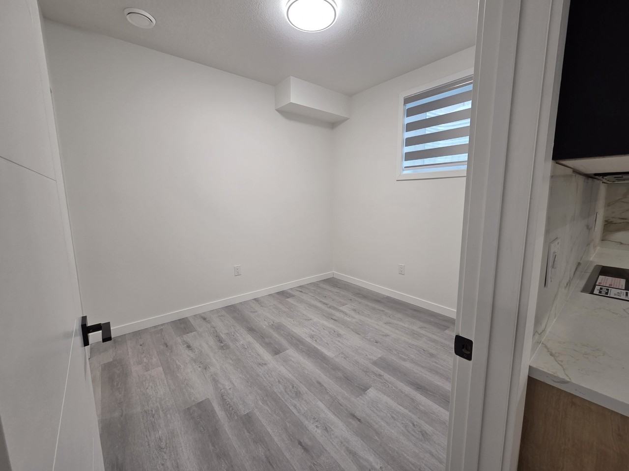 8015 83 St NW Basement Suite - Photo 2 of 8