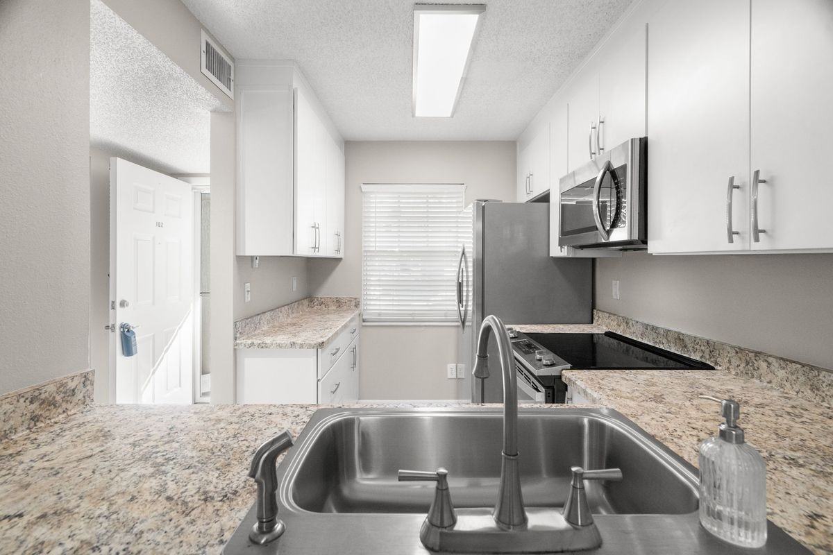 1438 Millstream Ln ##102 - Photo 2 of 12