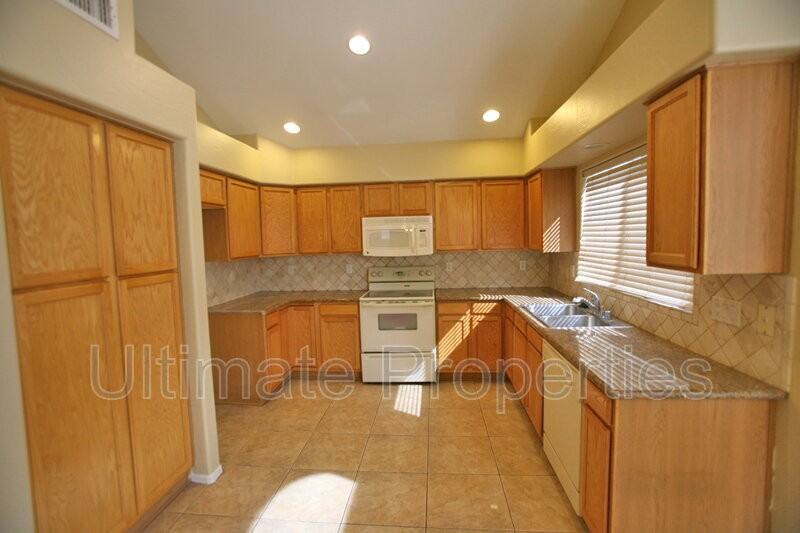 6345 W Rowel Rd - Photo 6 of 15