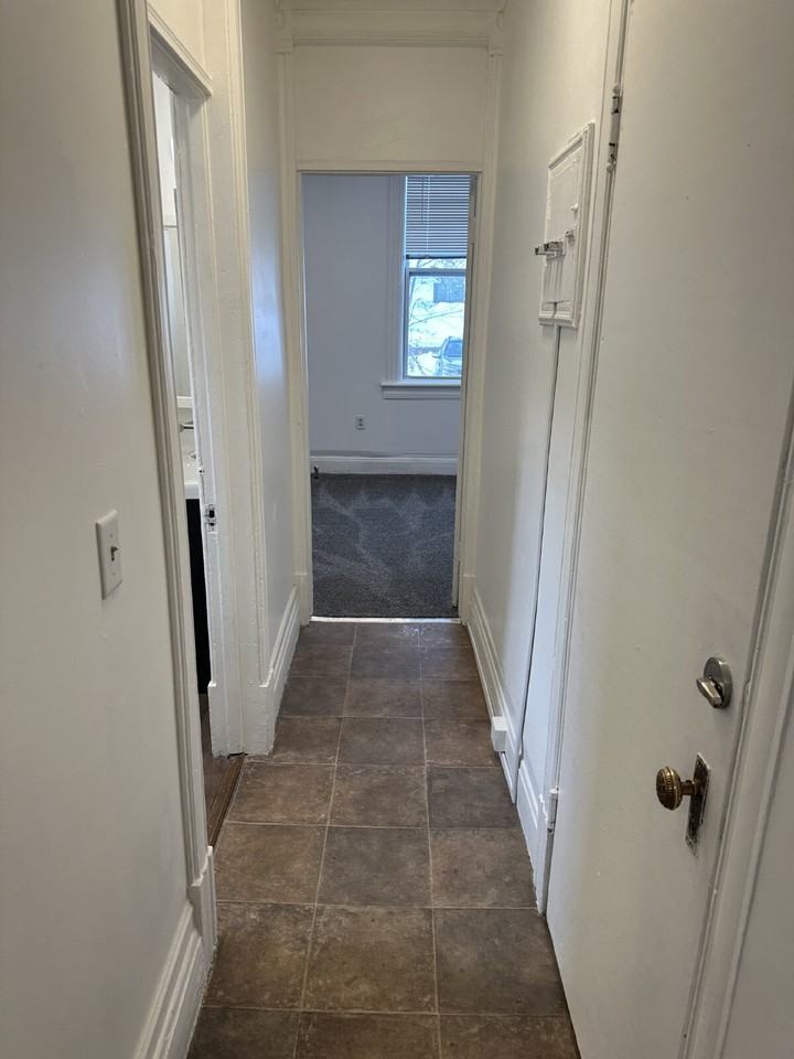 115 E 3rd St - Photo 5 of 7