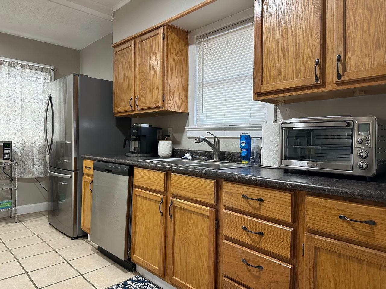 2115 E 68th Ter - Photo 3 of 5