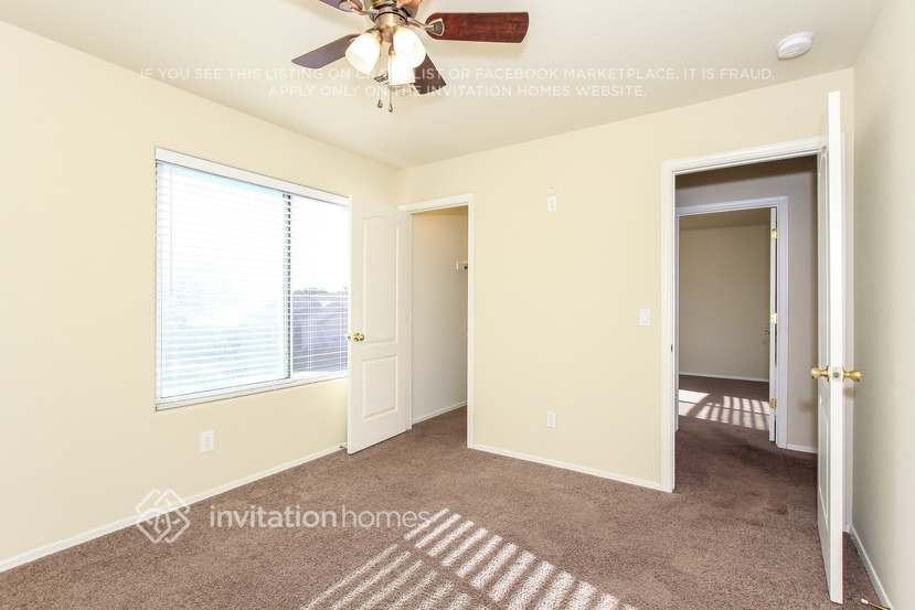 8228 W Harmony Ln - Photo 7 of 13