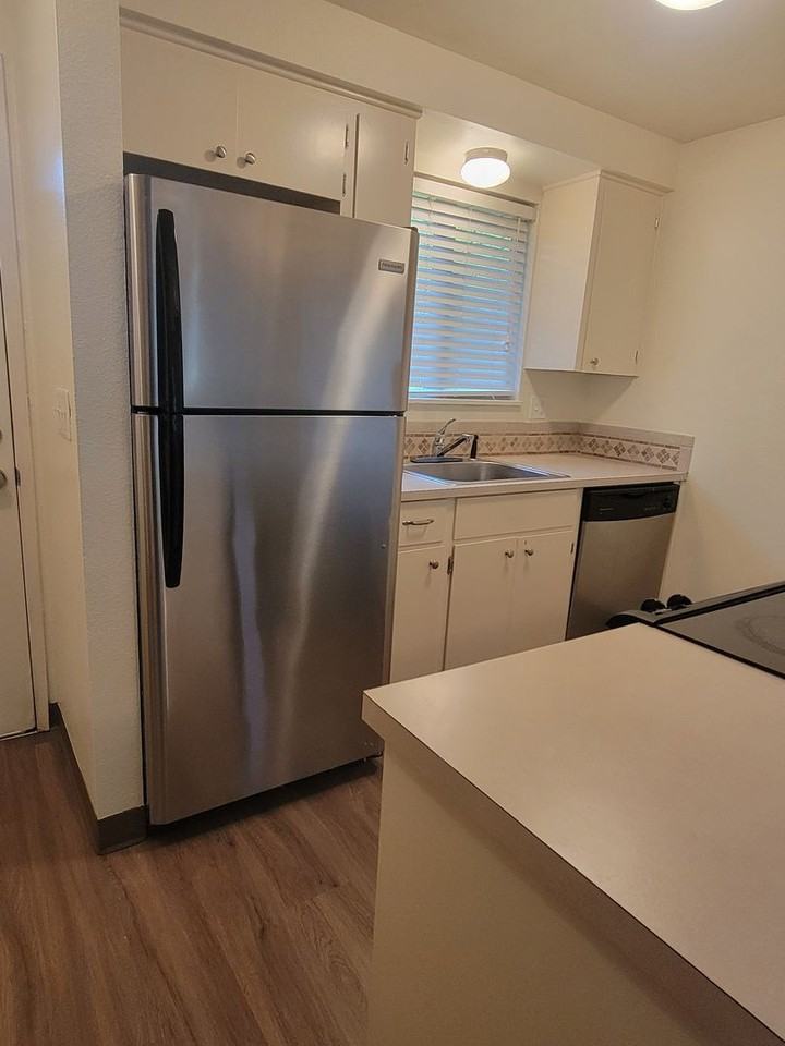 #166 WHEATLAND VILLAGE APARTMENTS - Photo 2 of 14