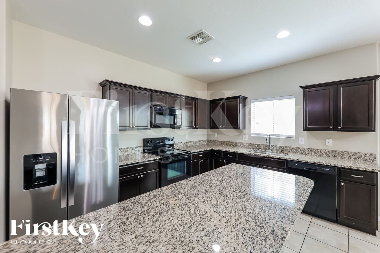 4936 S 238th Ln - Photo 7 of 20