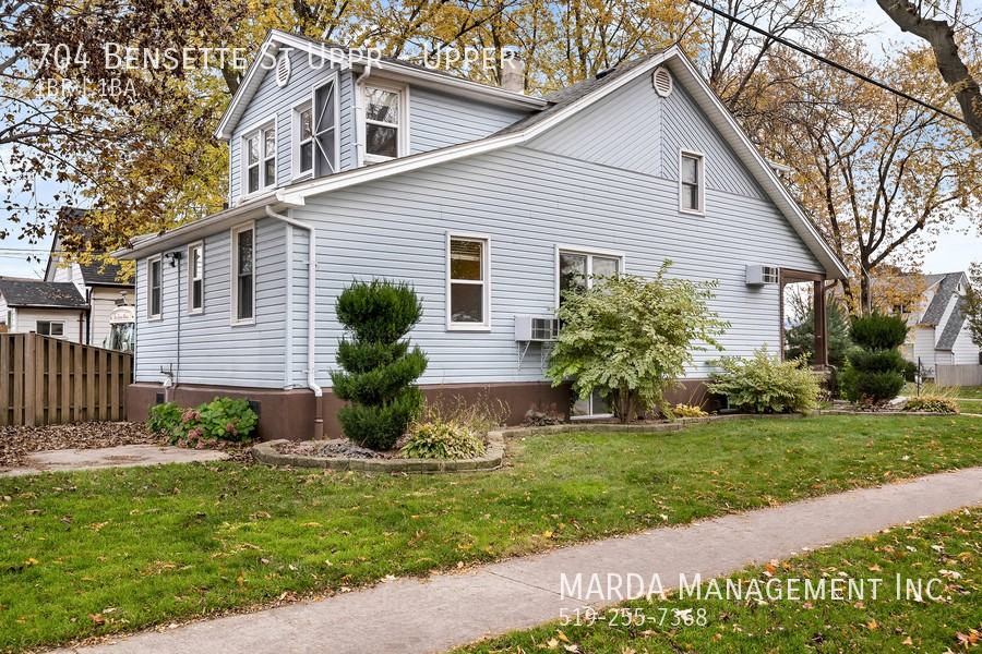 704 Bensette St Uppr - Photo 2 of 18