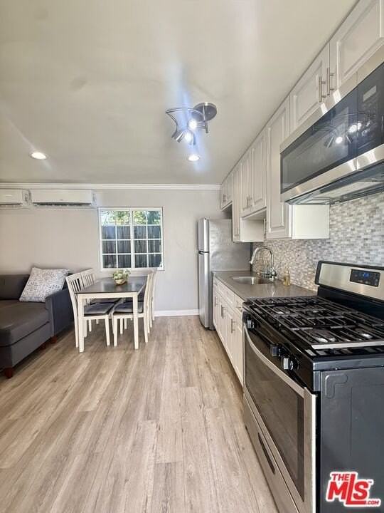 18002 Collins St - Photo 4 of 14