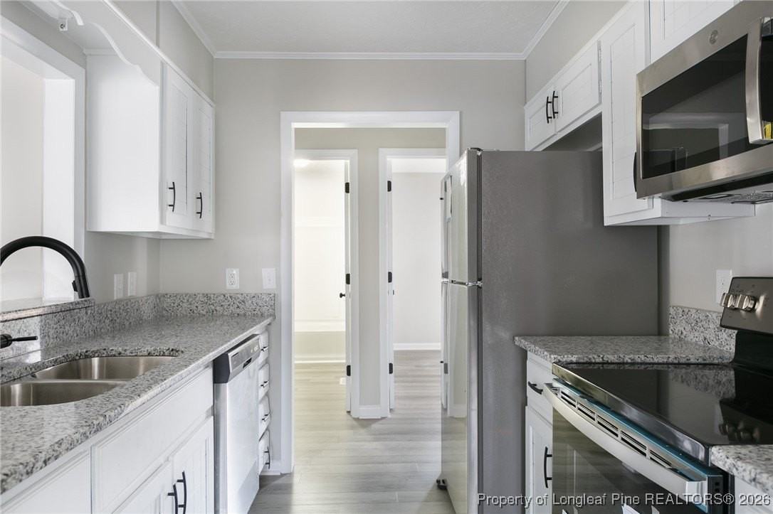 7128 Old Castle Dr - Photo 6 of 15