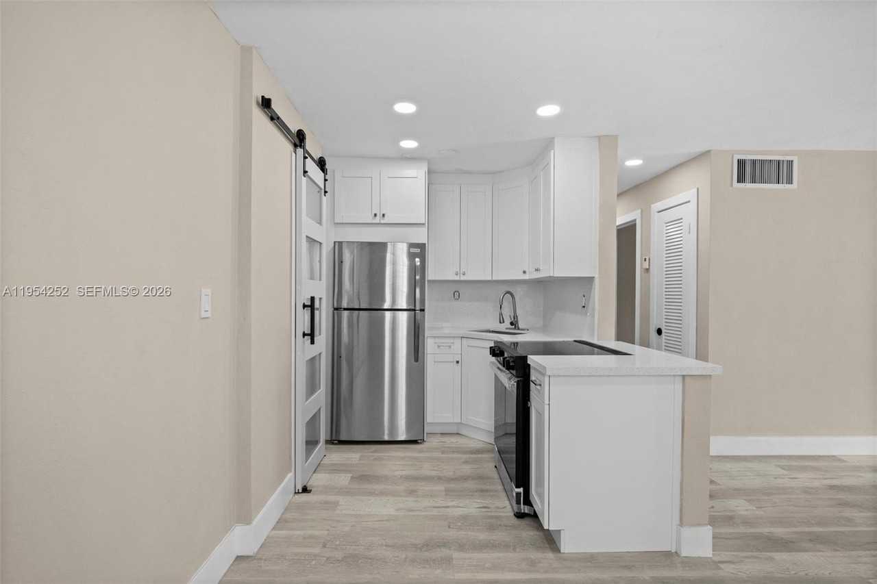 8701 Sw 141st St #A7 - Photo 2 of 18