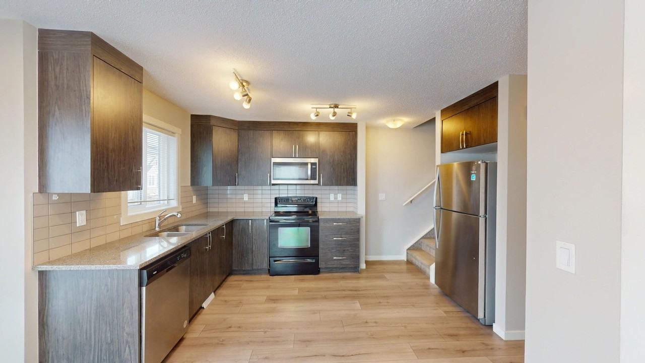 1004 - 7451 Falconridge Blvd NE - Photo 3 of 36