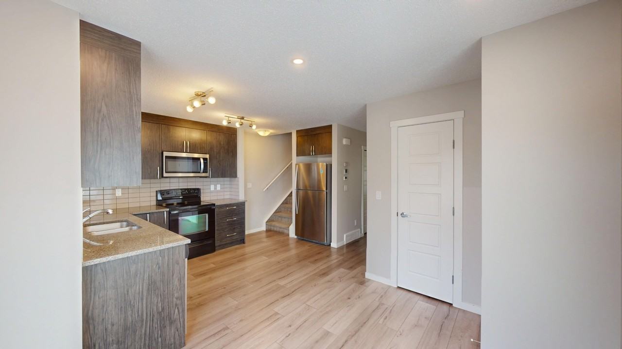 1004 - 7451 Falconridge Blvd NE - Photo 5 of 36