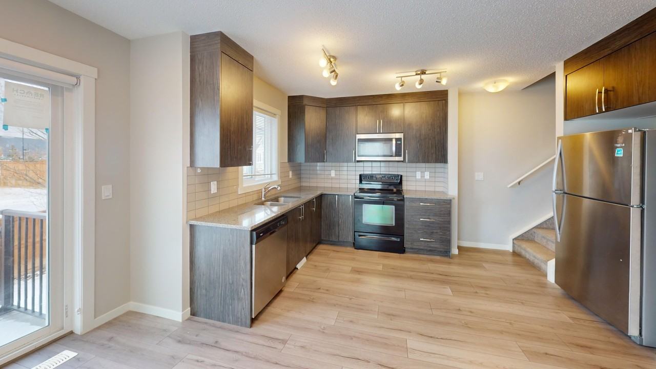 1004 - 7451 Falconridge Blvd NE - Photo 7 of 36