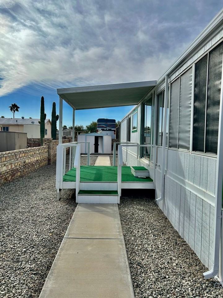 13281 E 50th Dr - Photo 3 of 27