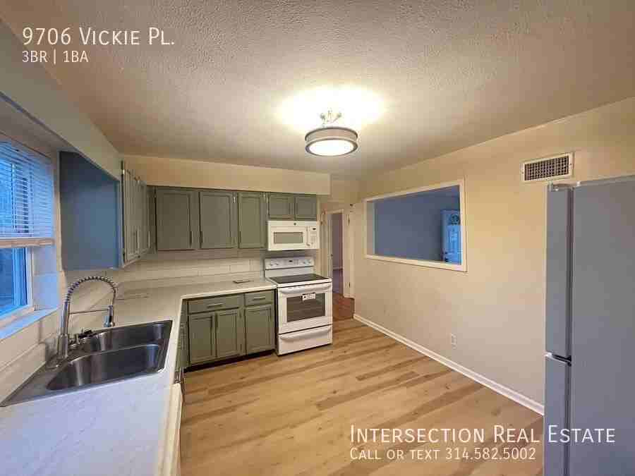 9706 Vickie Pl - Photo 7 of 15