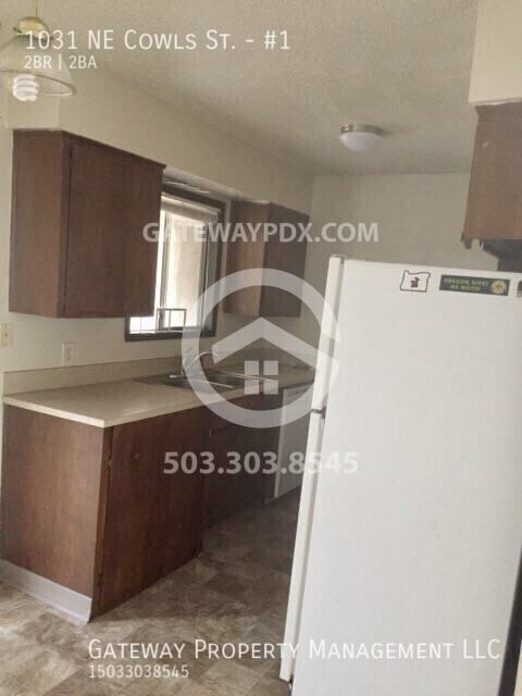 1031 Ne Cowls St #1 - Photo 6 of 18