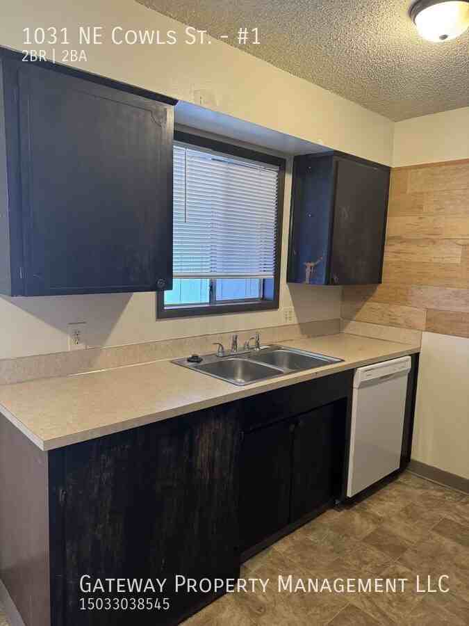 1031 Ne Cowls St #1 - Photo 7 of 18