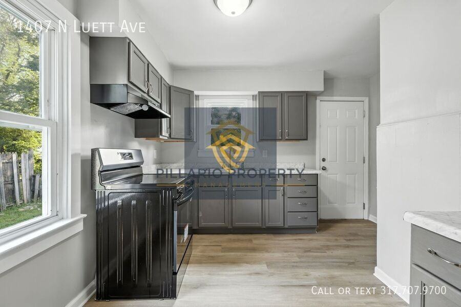 1407 N Luett Ave - Photo 5 of 16