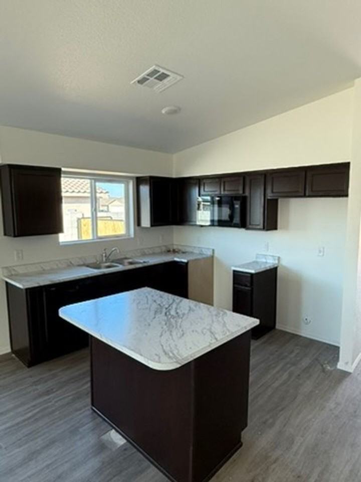 7887 E 46th Pl - Photo 3 of 11